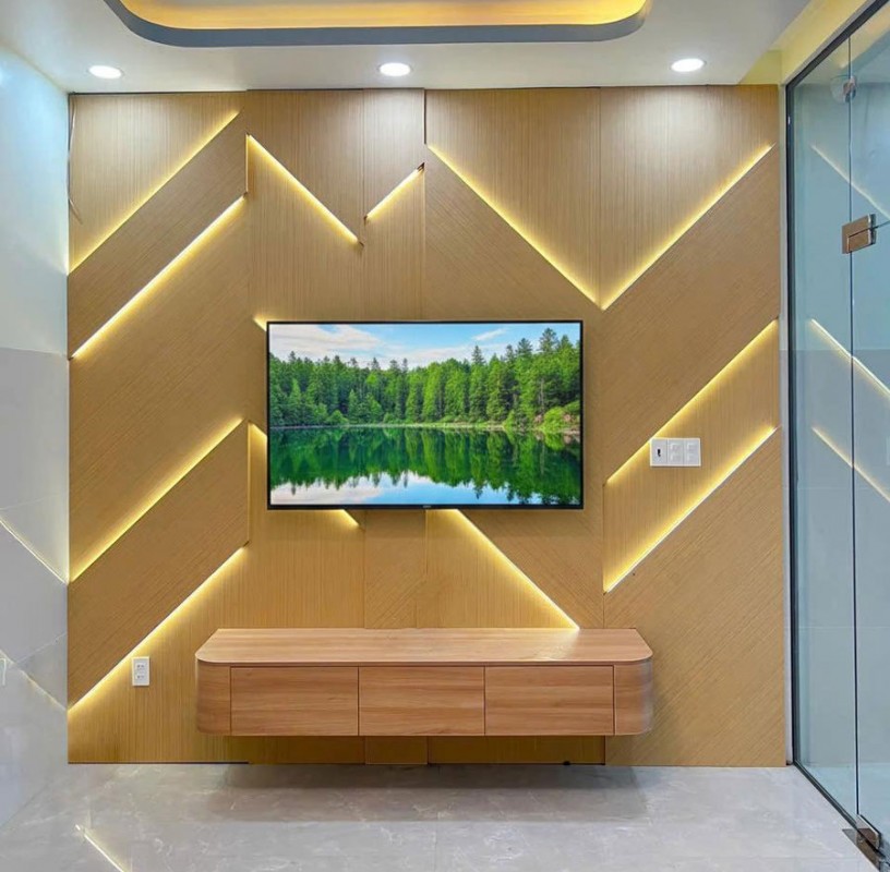 phòng khách được ốp tấm than tre